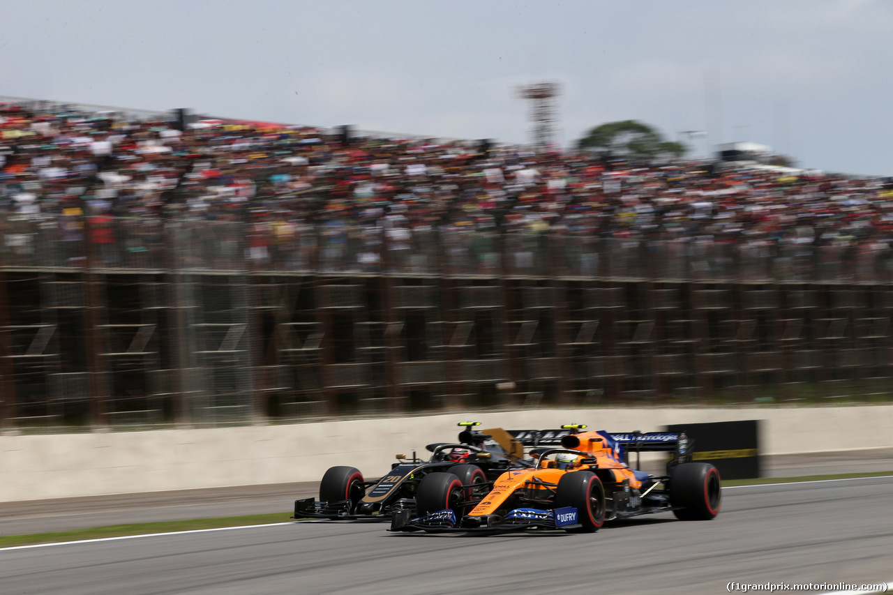 GP BRASILE, 17.11.2019 - Gara, Lando Norris (GBR) Mclaren F1 Team MCL34 e Kevin Magnussen (DEN) Haas F1 Team VF-19