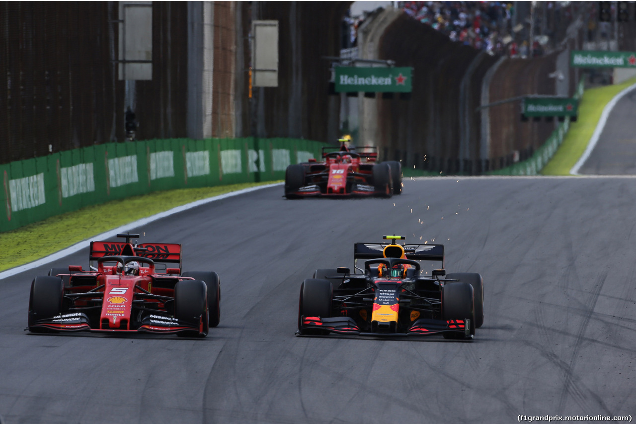 GP BRASILE, 17.11.2019 - Gara, Sebastian Vettel (GER) Ferrari SF90 e Alexander Albon (THA) Red Bull Racing RB15
