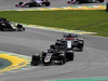 GP BRASILE, 17.11.2019 - Gara, Romain Grosjean (FRA) Haas F1 Team VF-19 e Kimi Raikkonen (FIN) Alfa Romeo Racing C38