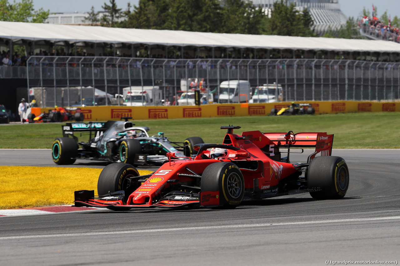 GP CANADA, 09.06.2019 - Gara, Sebastian Vettel (GER) Ferrari SF90 e Lewis Hamilton (GBR) Mercedes AMG F1 W10