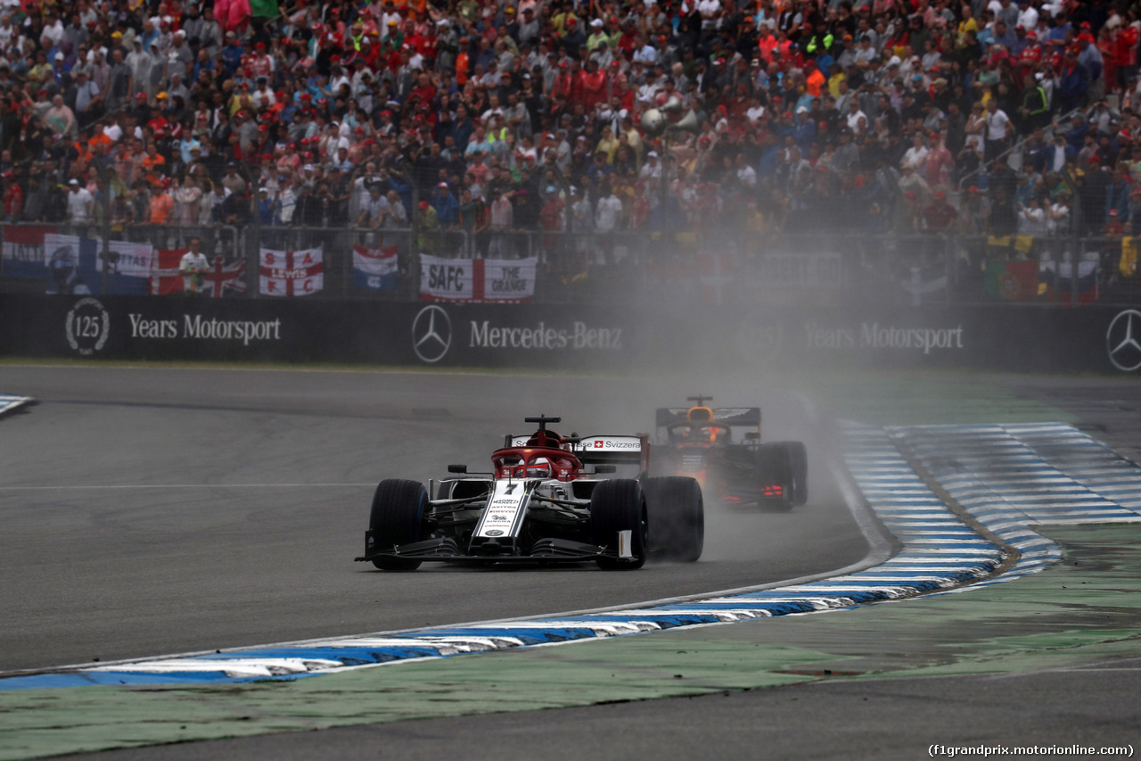 GP GERMANIA, 28.07.2019 - Gara, Kimi Raikkonen (FIN) Alfa Romeo Racing C38 e Max Verstappen (NED) Red Bull Racing RB15
