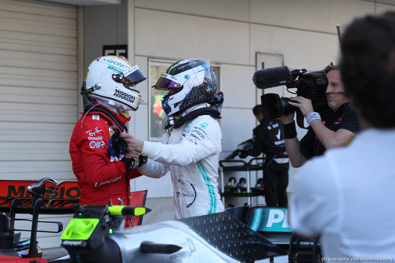 GP GIAPPONE, 13.10.2019- Festeggiamenti in parc fermee, winner Valtteri Bottas (FIN) Mercedes AMG F1 W10 EQ Power with Sebastian Vettel (GER) Ferrari SF90