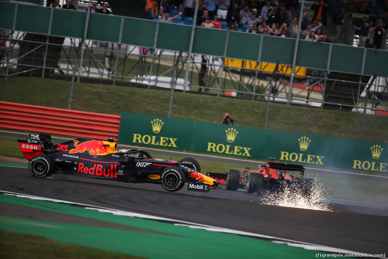 GP GRAN BRETAGNA, 14.07.2019- Gara,  Sebastian Vettel (GER) Ferrari SF90 crash with Max Verstappen (NED) Red Bull Racing RB15