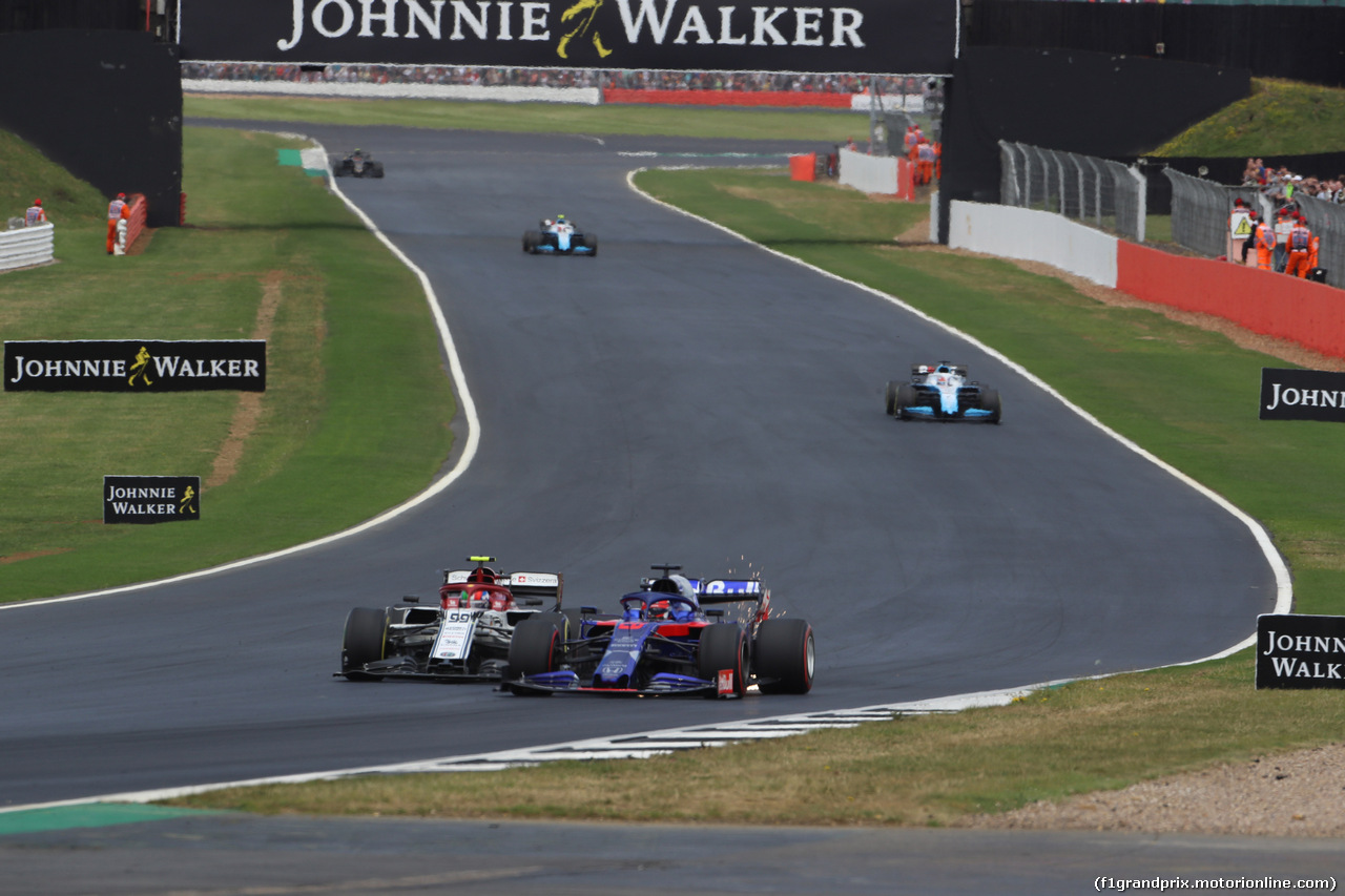 GP GRAN BRETAGNA, 14.07.2019- Gara, Daniil Kvyat (RUS) Scuderia Toro Rosso STR14 battle for the position withAntonio Giovinazzi (ITA) Alfa Romeo Racing C38