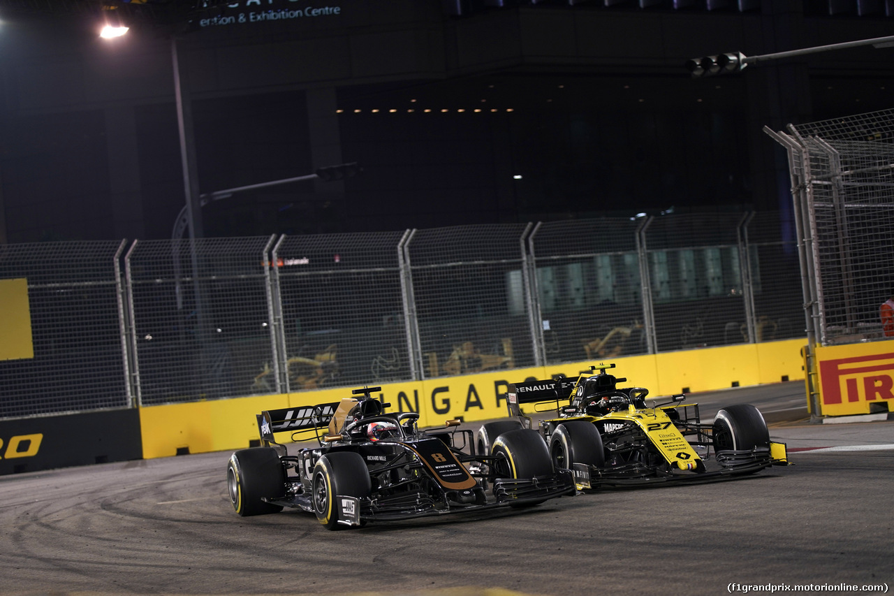 GP SINGAPORE, 22.09.2019 - Gara, Romain Grosjean (FRA) Haas F1 Team VF-19 e Nico Hulkenberg (GER) Renault Sport F1 Team RS19