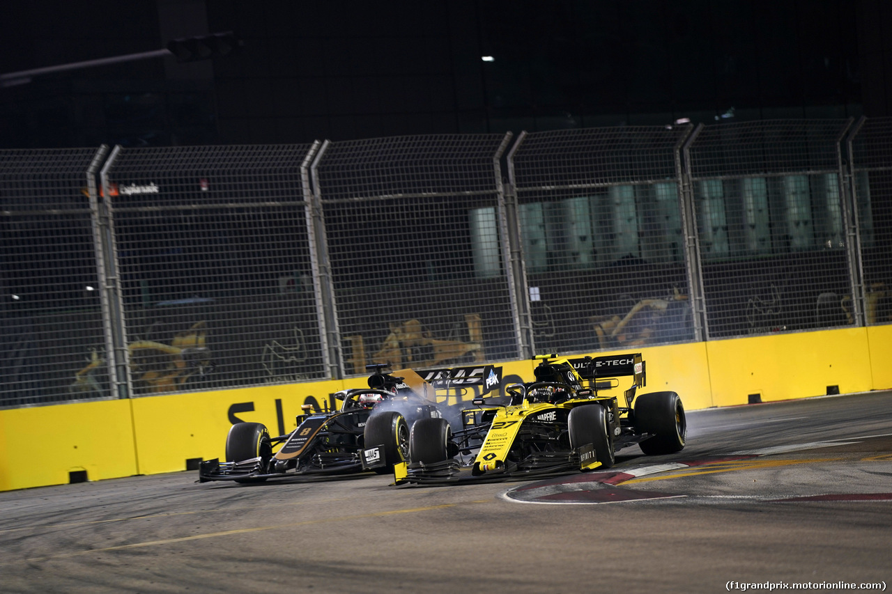 GP SINGAPORE, 22.09.2019 - Gara, Romain Grosjean (FRA) Haas F1 Team VF-19 e Nico Hulkenberg (GER) Renault Sport F1 Team RS19