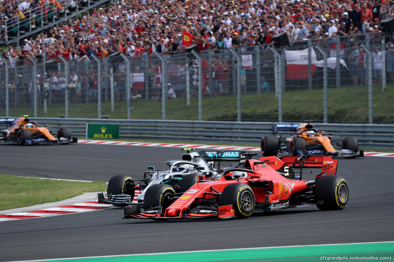 GP UNGHERIA, 04.08.2019 - Gara, Valtteri Bottas (FIN) Mercedes AMG F1 W010 e Sebastian Vettel (GER) Ferrari SF90