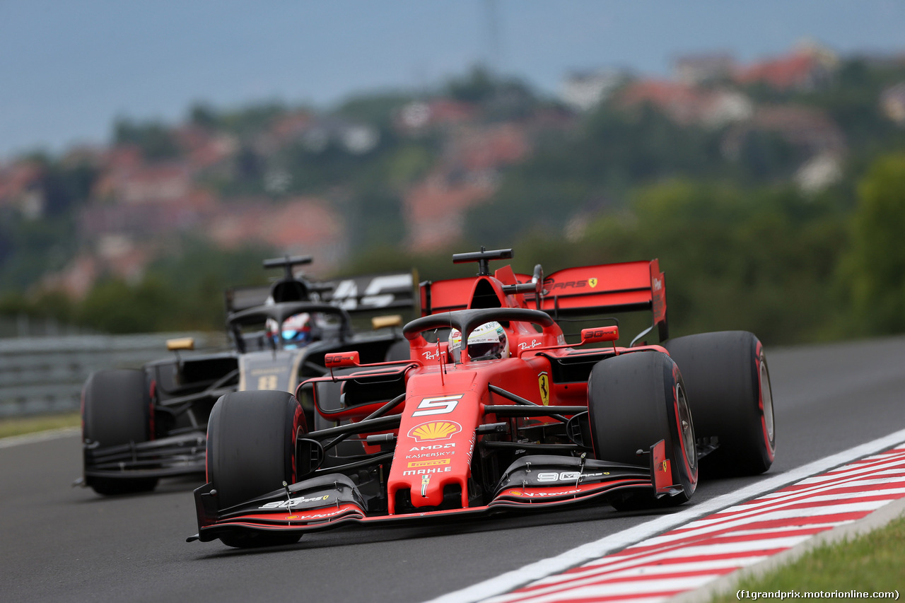 GP UNGHERIA, 02.08.2019 - Prove Libere 1, Romain Grosjean (FRA) Haas F1 Team VF-19 e Sebastian Vettel (GER) Ferrari SF90