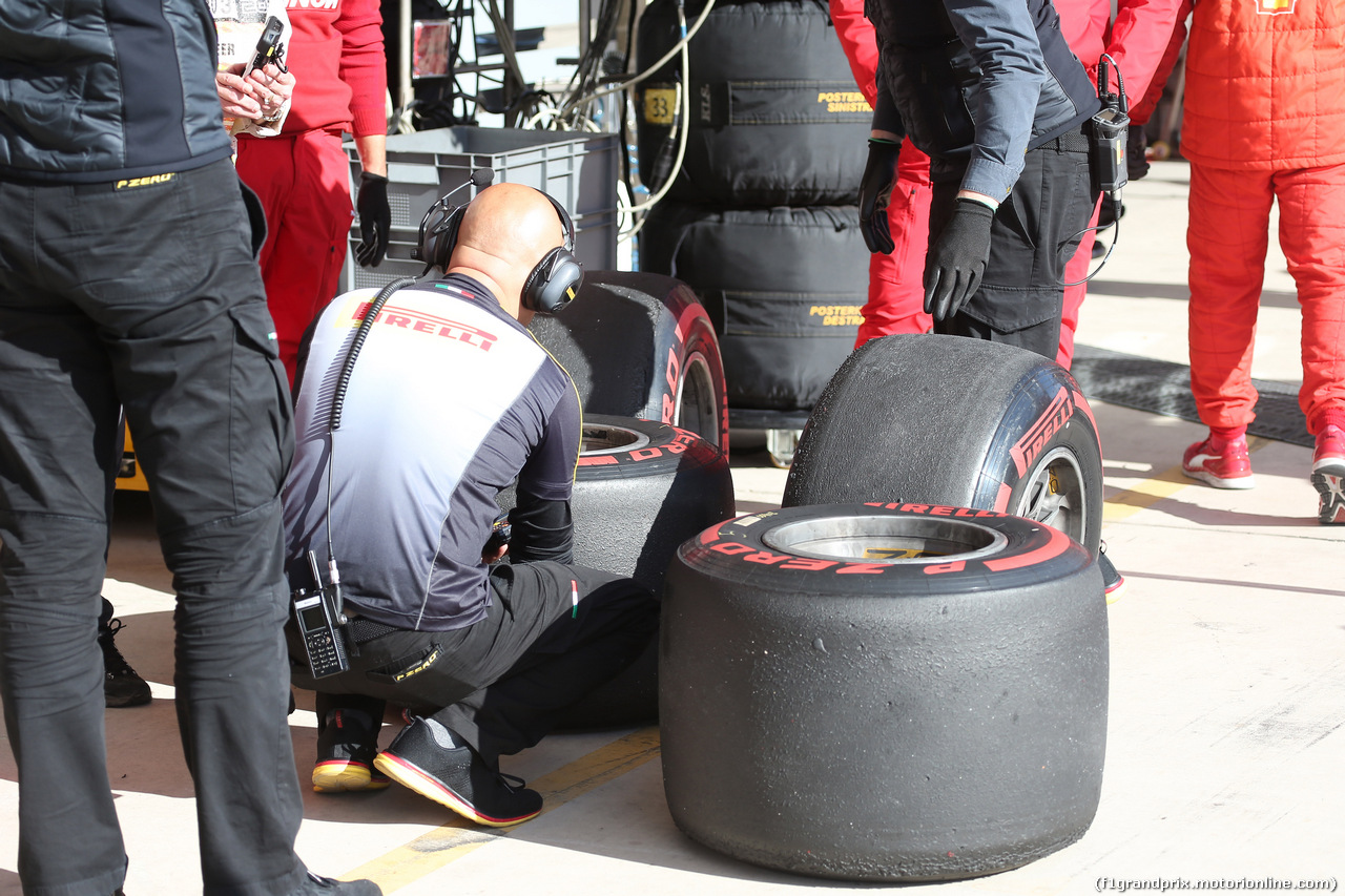 GP USA, 01.11.2019- Free practice 2, Pirelli technician checks Sebastian Vettel (GER) Ferrari SF90 tyres