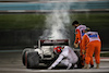 GP ABU DHABI, Kimi Raikkonen (FIN) Alfa Romeo Racing C39 in the second practice session with marshals putting out a fire.
11.12.2020. Formula 1 World Championship, Rd 17, Abu Dhabi Grand Prix, Yas Marina Circuit, Abu Dhabi, Practice Day.
- www.xpbimages.com, EMail: requests@xpbimages.com © Copyright: Batchelor / XPB Images