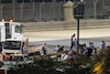 GP BAHRAIN, Marshals remove the Haas VF-20 of Romain Grosjean (FRA) after he crashed at the partenza of the race e exploded into flames.
29.11.2020. Formula 1 World Championship, Rd 15, Bahrain Grand Prix, Sakhir, Bahrain, Gara Day.
- www.xpbimages.com, EMail: requests@xpbimages.com © Copyright: Moy / XPB Images