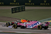 GP SAKHIR, Alexander Albon (THA) Red Bull Racing RB16 e Sergio Perez (MEX) Racing Point F1 Team RP19.
06.12.2020. Formula 1 World Championship, Rd 16, Sakhir Grand Prix, Sakhir, Bahrain, Gara Day.
- www.xpbimages.com, EMail: requests@xpbimages.com © Copyright: Moy / XPB Images