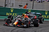 GP ABU DHABI, Sergio Perez (MEX) Red Bull Racing RB16B davanti a Lewis Hamilton (GBR) Mercedes AMG F1 W12.
12.12.2021. Formula 1 World Championship, Rd 22, Abu Dhabi Grand Prix, Yas Marina Circuit, Abu Dhabi, Gara Day.
- www.xpbimages.com, EMail: requests@xpbimages.com © Copyright: Moy / XPB Images