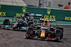 GP ABU DHABI, Sergio Perez (MEX) Red Bull Racing RB16B davanti a Lewis Hamilton (GBR) Mercedes AMG F1 W12.
12.12.2021. Formula 1 World Championship, Rd 22, Abu Dhabi Grand Prix, Yas Marina Circuit, Abu Dhabi, Gara Day.
- www.xpbimages.com, EMail: requests@xpbimages.com © Copyright: Moy / XPB Images