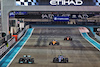 GP ABU DHABI, Lewis Hamilton (GBR) Mercedes AMG F1 W12 e Esteban Ocon (FRA) Alpine F1 Team A521.
12.12.2021. Formula 1 World Championship, Rd 22, Abu Dhabi Grand Prix, Yas Marina Circuit, Abu Dhabi, Gara Day.
- www.xpbimages.com, EMail: requests@xpbimages.com © Copyright: Bearne / XPB Images