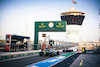 GP ABU DHABI, Lando Norris (GBR) McLaren MCL35M e Lance Stroll (CDN) Aston Martin F1 Team AMR21 leave the pits.
11.12.2021. Formula 1 World Championship, Rd 22, Abu Dhabi Grand Prix, Yas Marina Circuit, Abu Dhabi, Qualifiche Day.
- www.xpbimages.com, EMail: requests@xpbimages.com © Copyright: Bearne / XPB Images