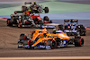 GP BAHRAIN, Lando Norris (GBR) McLaren MCL35M e Daniel Ricciardo (AUS) McLaren MCL35M battle for position.
28.03.2021. Formula 1 World Championship, Rd 1, Bahrain Grand Prix, Sakhir, Bahrain, Gara Day.
- www.xpbimages.com, EMail: requests@xpbimages.com © Copyright: Charniaux / XPB Images