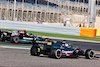 GP BAHRAIN, Sebastian Vettel (GER) Aston Martin F1 Team AMR21 passes Valtteri Bottas (FIN) Mercedes AMG F1 W12 who has run wide.
27.03.2021. Formula 1 World Championship, Rd 1, Bahrain Grand Prix, Sakhir, Bahrain, Qualifiche Day.
- www.xpbimages.com, EMail: requests@xpbimages.com © Copyright: Batchelor / XPB Images