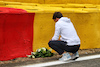 GP BELGIO, Pierre Gasly (FRA) AlphaTauri pays his respects to Anthoine Hubert.
26.08.2021. Formula 1 World Championship, Rd 12, Belgian Grand Prix, Spa Francorchamps, Belgium, Preparation Day.
- www.xpbimages.com, EMail: requests@xpbimages.com © Copyright: Moy / XPB Images