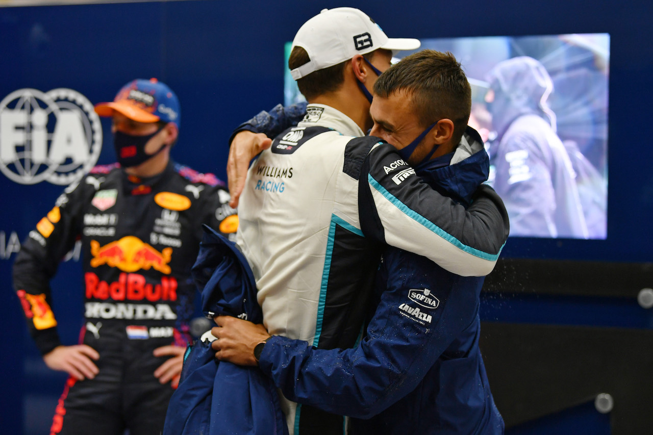GP BELGIO, George Russell (GBR) Williams Racing celebrates his second position in qualifying parc ferme with Aleix Casanovas, Williams Racing Trainer.
28.08.2021. Formula 1 World Championship, Rd 12, Belgian Grand Prix, Spa Francorchamps, Belgium, Qualifiche Day.
- www.xpbimages.com, EMail: requests@xpbimages.com © Copyright: FIA Pool Image for Editorial Use Only