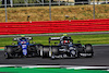 GP GRAN BRETAGNA, Esteban Ocon (FRA) Alpine F1 Team A521 e Pierre Gasly (FRA) AlphaTauri AT02 battle for position.
18.07.2021. Formula 1 World Championship, Rd 10, British Grand Prix, Silverstone, England, Gara Day.
 - www.xpbimages.com, EMail: requests@xpbimages.com © Copyright: Davenport / XPB Images