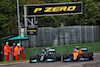 GP IMOLA, (L to R): Lewis Hamilton (GBR) Mercedes AMG F1 W12 e Lando Norris (GBR) McLaren MCL35M battle for position.
18.04.2021. Formula 1 World Championship, Rd 2, Emilia Romagna Grand Prix, Imola, Italy, Gara Day.
- www.xpbimages.com, EMail: requests@xpbimages.com © Copyright: Batchelor / XPB Images