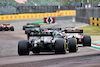 GP IMOLA, Kimi Raikkonen (FIN) Alfa Romeo Racing C41 davanti a Lewis Hamilton (GBR) Mercedes AMG F1 W12.
18.04.2021. Formula 1 World Championship, Rd 2, Emilia Romagna Grand Prix, Imola, Italy, Gara Day.
- www.xpbimages.com, EMail: requests@xpbimages.com © Copyright: Batchelor / XPB Images