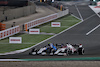 GP QATAR, Kimi Raikkonen (FIN) Alfa Romeo Racing C41 e Nicholas Latifi (CDN) Williams Racing FW43B battle for position.
21.11.2021. Formula 1 World Championship, Rd 20, Qatar Grand Prix, Doha, Qatar, Gara Day.
- www.xpbimages.com, EMail: requests@xpbimages.com © Copyright: Moy / XPB Images