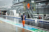 GP RUSSIA, Circuit Atmosfera - a wet pit lane as rain falls.
25.09.2021. Formula 1 World Championship, Rd 15, Russian Grand Prix, Sochi Autodrom, Sochi, Russia, Qualifiche Day.
- www.xpbimages.com, EMail: requests@xpbimages.com © Copyright: Bearne / XPB Images