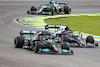 GP SAN PAOLO, Lewis Hamilton (GBR) Mercedes AMG F1 W12 e Yuki Tsunoda (JPN) AlphaTauri AT02 battle for position.
13.11.2021. Formula 1 World Championship, Rd 19, Brazilian Grand Prix, Sao Paulo, Brazil, Sprint Gara Day.
- www.xpbimages.com, EMail: requests@xpbimages.com © Copyright: Charniaux / XPB Images