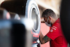 GP STATI UNITI, Ferrari mechanic with Pirelli tyres.
21.10.2021. Formula 1 World Championship, Rd 17, United States Grand Prix, Austin, Texas, USA, Preparation Day.
- www.xpbimages.com, EMail: requests@xpbimages.com © Copyright: Price / XPB Images