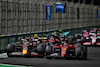 GP ARABIA SAUDITA, Max Verstappen (NLD) Red Bull Racing RB18 e Charles Leclerc (MON) Ferrari F1-75 battle for the lead of the race.
27.03.2022. Formula 1 World Championship, Rd 2, Saudi Arabian Grand Prix, Jeddah, Saudi Arabia, Gara Day.
 - www.xpbimages.com, EMail: requests@xpbimages.com © Copyright: Coates / XPB Images