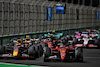 GP ARABIA SAUDITA, Max Verstappen (NLD) Red Bull Racing RB18 e Charles Leclerc (MON) Ferrari F1-75 battle for the lead of the race.
27.03.2022. Formula 1 World Championship, Rd 2, Saudi Arabian Grand Prix, Jeddah, Saudi Arabia, Gara Day.
 - www.xpbimages.com, EMail: requests@xpbimages.com © Copyright: Coates / XPB Images