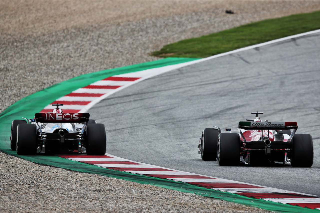 GP AUSTRIA, George Russell (GBR) Mercedes AMG F1 W13 e Valtteri Bottas (FIN) Alfa Romeo F1 Team C42 battle for position.
10.07.2022. Formula 1 World Championship, Rd 11, Austrian Grand Prix, Spielberg, Austria, Gara Day.
 - www.xpbimages.com, EMail: requests@xpbimages.com © Copyright: Coates / XPB Images