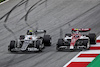 GP AUSTRIA, (L to R): Yuki Tsunoda (JPN) AlphaTauri AT03 e Guanyu Zhou (CHN) Alfa Romeo F1 Team C42 battle for position.
10.07.2022. Formula 1 World Championship, Rd 11, Austrian Grand Prix, Spielberg, Austria, Gara Day.
 - www.xpbimages.com, EMail: requests@xpbimages.com © Copyright: Coates / XPB Images