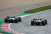 GP AUSTRIA, George Russell (GBR) Mercedes AMG F1 W13 e Valtteri Bottas (FIN) Alfa Romeo F1 Team C42 battle for position.
10.07.2022. Formula 1 World Championship, Rd 11, Austrian Grand Prix, Spielberg, Austria, Gara Day.
 - www.xpbimages.com, EMail: requests@xpbimages.com © Copyright: Coates / XPB Images