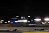 GP BAHRAIN, Lando Norris (GBR) McLaren MCL36 e Lance Stroll (CDN) Aston Martin F1 Team AMR22.
20.03.2022. Formula 1 World Championship, Rd 1, Bahrain Grand Prix, Sakhir, Bahrain, Gara Day.
 - www.xpbimages.com, EMail: requests@xpbimages.com © Copyright: Coates / XPB Images