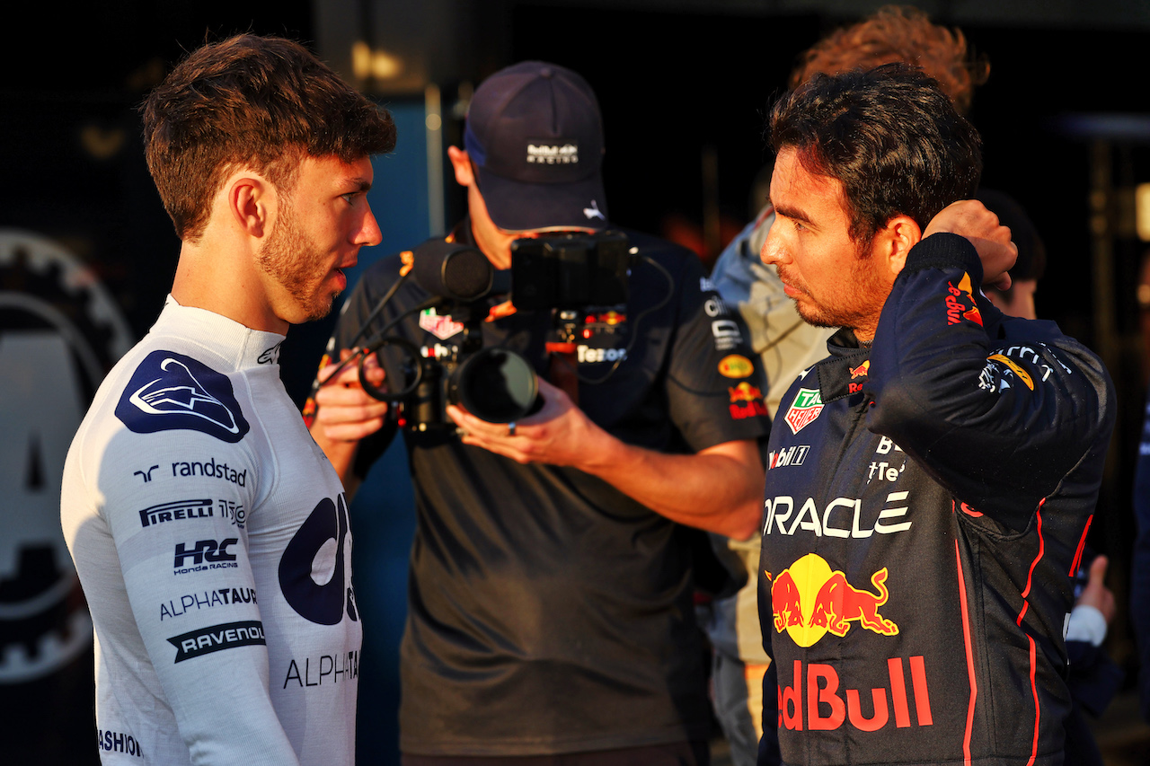 GP BAHRAIN, (L to R): Pierre Gasly (FRA) AlphaTauri with Sergio Perez (MEX) Red Bull Racing.
17.03.2022. Formula 1 World Championship, Rd 1, Bahrain Grand Prix, Sakhir, Bahrain, Preparation Day.
- www.xpbimages.com, EMail: requests@xpbimages.com © Copyright: Batchelor / XPB Images