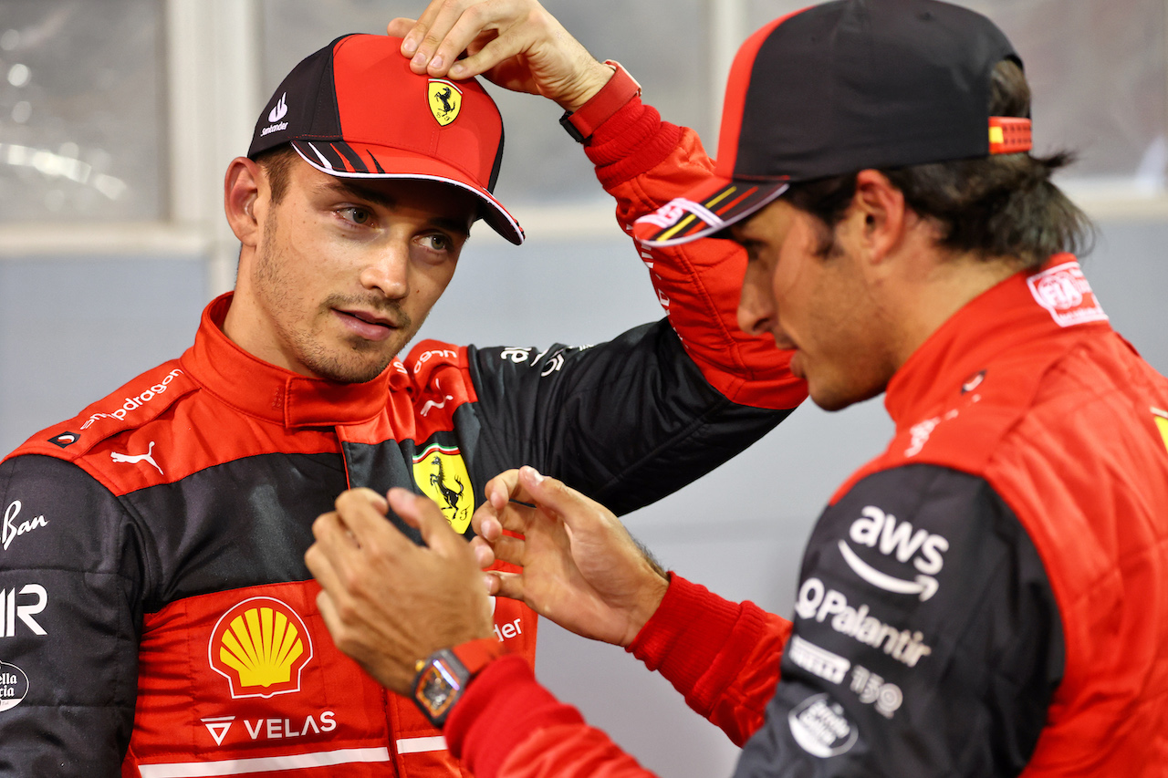 GP BAHRAIN, (L to R): Pole sitter Charles Leclerc (MON) Ferrari with team mate Carlos Sainz Jr (ESP) Ferrari in qualifying parc ferme.
19.03.2022. Formula 1 World Championship, Rd 1, Bahrain Grand Prix, Sakhir, Bahrain, Qualifiche Day.
- www.xpbimages.com, EMail: requests@xpbimages.com © Copyright: Batchelor / XPB Images