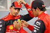 GP BAHRAIN, (L to R): Pole sitter Charles Leclerc (MON) Ferrari with team mate Carlos Sainz Jr (ESP) Ferrari in qualifying parc ferme.
19.03.2022. Formula 1 World Championship, Rd 1, Bahrain Grand Prix, Sakhir, Bahrain, Qualifiche Day.
- www.xpbimages.com, EMail: requests@xpbimages.com © Copyright: Batchelor / XPB Images