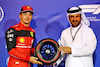 GP BAHRAIN, (L to R): Charles Leclerc (MON) Ferrari celebrates his pole position with Mohammed Bin Sulayem (UAE) FIA President in qualifying parc ferme.
19.03.2022. Formula 1 World Championship, Rd 1, Bahrain Grand Prix, Sakhir, Bahrain, Qualifiche Day.
- www.xpbimages.com, EMail: requests@xpbimages.com © Copyright: Batchelor / XPB Images