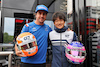 GP BELGIO, (L to R): Fernando Alonso (ESP) Alpine F1 Team swapping helmets with Yuki Tsunoda (JPN) AlphaTauri.
27.08.2022. Formula 1 World Championship, Rd 14, Belgian Grand Prix, Spa Francorchamps, Belgium, Qualifiche Day.
- www.xpbimages.com, EMail: requests@xpbimages.com © Copyright: Moy / XPB Images
