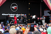 GP BELGIO, Circuit Atmosfera - (L to R): Esteban Ocon (FRA) Alpine F1 Team e Fernando Alonso (ESP) Alpine F1 Team on the FanZone stage.
27.08.2022. Formula 1 World Championship, Rd 14, Belgian Grand Prix, Spa Francorchamps, Belgium, Qualifiche Day.
 - www.xpbimages.com, EMail: requests@xpbimages.com © Copyright: Coates / XPB Images