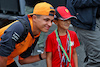 GP BELGIO, Lando Norris (GBR) McLaren with a young fan.
26.08.2022. Formula 1 World Championship, Rd 14, Belgian Grand Prix, Spa Francorchamps, Belgium, Practice Day.
- www.xpbimages.com, EMail: requests@xpbimages.com © Copyright: Batchelor / XPB Images