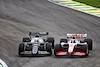 GP BRASILE, Pierre Gasly (FRA) AlphaTauri AT03 e Mick Schumacher (GER) Haas VF-22 battle for position.
13.11.2022. Formula 1 World Championship, Rd 21, Brazilian Grand Prix, Sao Paulo, Brazil, Gara Day.
 - www.xpbimages.com, EMail: requests@xpbimages.com © Copyright: Coates / XPB Images
