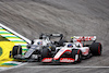 GP BRASILE, Pierre Gasly (FRA) AlphaTauri AT03 e Mick Schumacher (GER) Haas VF-22 battle for position.
13.11.2022. Formula 1 World Championship, Rd 21, Brazilian Grand Prix, Sao Paulo, Brazil, Gara Day.
 - www.xpbimages.com, EMail: requests@xpbimages.com © Copyright: Coates / XPB Images