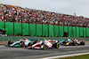 GP BRASILE, Lewis Hamilton (GBR) Mercedes AMG F1 W13 e Mick Schumacher (GER) Haas VF-22 battle for position.
13.11.2022. Formula 1 World Championship, Rd 21, Brazilian Grand Prix, Sao Paulo, Brazil, Gara Day.
 - www.xpbimages.com, EMail: requests@xpbimages.com © Copyright: Coates / XPB Images