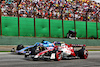 GP BRASILE, Fernando Alonso (ESP) Alpine F1 Team A522 e Guanyu Zhou (CHN) Alfa Romeo F1 Team C42 battle for position.
13.11.2022. Formula 1 World Championship, Rd 21, Brazilian Grand Prix, Sao Paulo, Brazil, Gara Day.
 - www.xpbimages.com, EMail: requests@xpbimages.com © Copyright: Coates / XPB Images