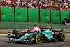 GP BRASILE, Lance Stroll (CDN) Aston Martin F1 Team AMR22 e Valtteri Bottas (FIN) Alfa Romeo F1 Team C42 battle for position.
13.11.2022. Formula 1 World Championship, Rd 21, Brazilian Grand Prix, Sao Paulo, Brazil, Gara Day.
 - www.xpbimages.com, EMail: requests@xpbimages.com © Copyright: Coates / XPB Images