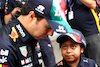 GP CITTA DEL MESSICO, (L to R): Sergio Perez (MEX) Red Bull Racing with a young fan.
27.10.2022. Formula 1 World Championship, Rd 20, Mexican Grand Prix, Mexico City, Mexico, Preparation Day.
 - www.xpbimages.com, EMail: requests@xpbimages.com © Copyright: Coates / XPB Images